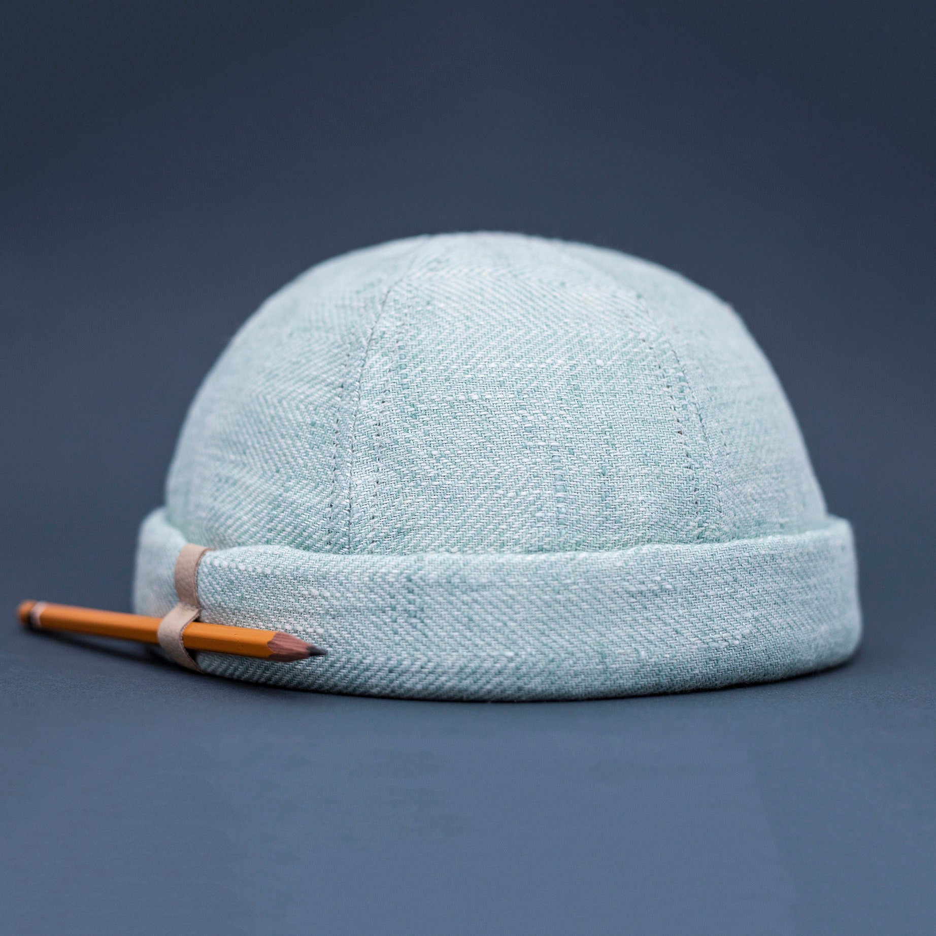 Handcrafted linen docker cap with pencil holder