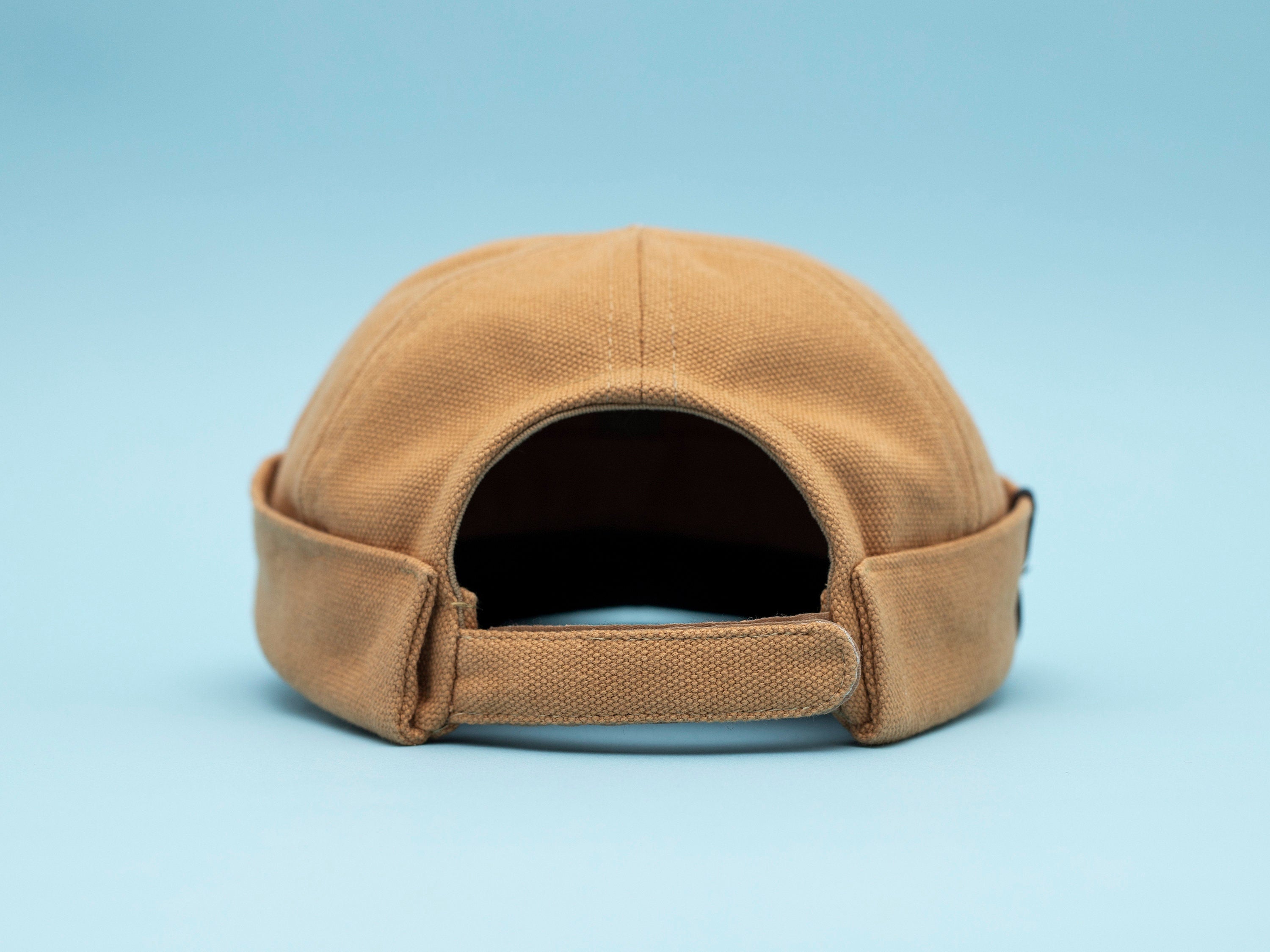 Handcrafted Docker cap with soft brim and pencil holder