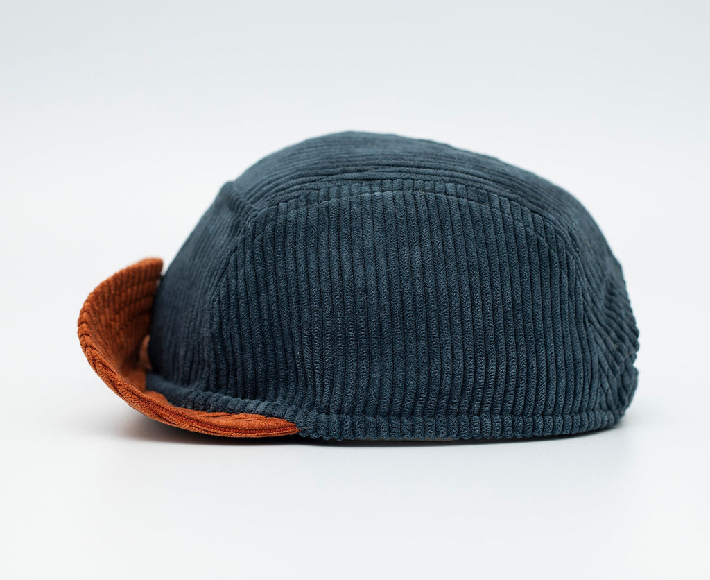 Handcrafted 5 panel cap with soft, flip up brim